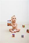 Baby playing with toy blocks