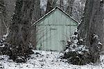 Shed in wintery landscape