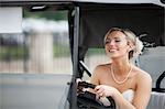 Bride Driving Golf Cart, Eagles Nest Golf Club, Vaughan, Ontario, Canada