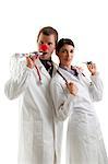 Male and female doctors with party toys