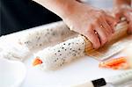 Close-up of Person Making Sushi