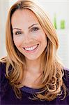 young woman with blond hair smiling