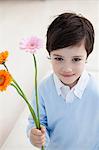 little boy with flowers