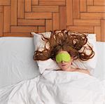 Woman sleeping, wearing eye-mask
