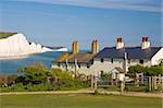 View of The Seven Sisters cliffs, the coastguard cottages on Seaford Head, South Downs Way, South Downs National Park, East Sussex, England, United Kingdom, Europe