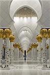 Gilded columns leading to the main prayer hall of Sheikh Zayed Bin Sultan Al Nahyan Mosque, Abu Dhabi, United Arab Emirates, Middle East