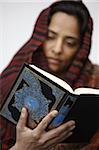 Woman reading Koran, Jordan, Middle East