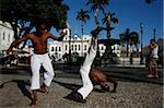 Some capoeira fighters on the 16 de novembro Square District of Pelourinho, Salvador de Bahia, Brazil, South America