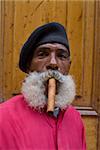 Revolutionary man smoking a cigar, Havana, Cuba, West Indies, Caribbean, Central America