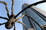 Maman Spider sculpture by Louise Bourgeois with Roppongi Hills Mori Tower in Roppongi, Tokyo, Japan, Asia