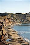 Cliff and beach on Havre-aux-Maisons island, Iles de la Madeleine (Magdalen Islands), Quebec, Canada, North America