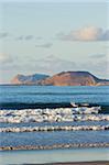 Graciosa Island beyond Lanzarote's finest surf beach at Famara in the north west of the island, Famara, Lanzarote, Canary Islands, Spain, Atlantic Ocean, Europe