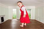 Big toddler girl in a tiny room