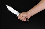 Hand Holding Knife