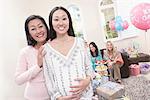 Mother and pregnant daughter at Baby Shower