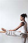 Ballet Dancer stretching at bar