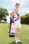 Woman Carrying Golf Bag