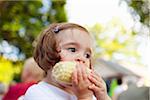 Little Girl Eating Cob of Corn