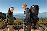 Couple hiking at coast, (portrait)