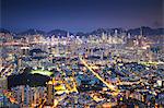 View of Kowloon and Hong Kong Island from Lion Rock at dusk, Hong Kong, China