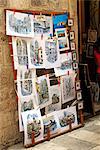 Balkans, Croatia, Dubrovnik. An artist's stand in the old town.