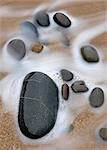 Wave and pebbles, Sandymouth Beach, Cornwall, UK