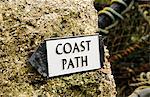 South West Coastal Path sign in Cadgwith Cove near The Lizard, Cornwall, UK