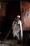 Ethiopia, Lalibela. A priest in one of the ancient rock-hewn churches of Lalibela.