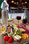 Lyon; France. An al fresco meal in a streetside cafe.