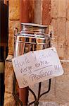 Rousillion; France. A hand made sign on a can of virgin olive oil for sale in Provence