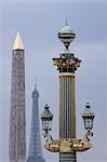 The Obelisk of Luxor, the Eiffel Tower and a lamp post in the Jardin des Tuileries in Paris