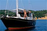 Girl sun-bathing on yacht