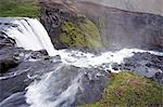 Iceland. The active tectonic nature of the interior of Iceland has resulted in a landscape dotted with spectacular waterfalls,such as this one viewed from the top near Laugavegur.