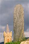 Ireland,Co. Donegal. Church of Ireland and standing stone,Glencolmbkille.