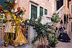 Venice Carnival People in Costumes and Masks