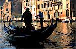 Italy, Veneto, Venice; Two gondolas moving through the Grand Canal.