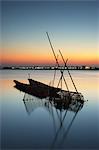 Boats on Mekong River at sunset, Savannakhet, Laos