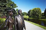 Statues in park next to city canal, Riga, Latvia