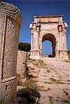 Libya; Tripolitania; Khums; An inscription on a stone and the Arch of Septimius Severus.