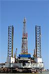 Africa, Namibia, Skeleton Coast, Walvis Bay. An oil derrick is tied up alongisde in the Walvis Bay Port.