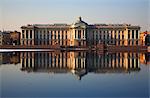 Russia, St.Peterburg; The majestic St.Petersburg Art Academy reflected on the Neva river. With the Sphinxes brought from Egypt.