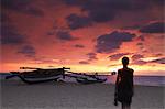 Woman walking on beach at sunset, Negombo, Sri Lank.