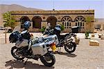 Syria, Aleppo. Motorbikes in front of the Bagdad Café.