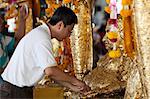 Bangkok, Thailand. Praying at a buddhist temple