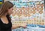 Woman looking at Kiev souvenirs, Kiev, Ukrain.