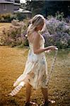 Woman Walking in Garden, High Park, Toronto, Ontario, Canada