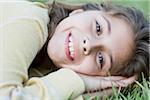 Girl Lying on Grass