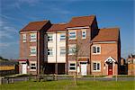 Modern two and three storey mews style terraced housing. Architects: Spawforth Associates