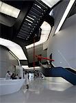 Main atrium, front desk and exhibition space at the MAXXI, National Museum of 21st Century Arts, Rome. Architects: Zaha Hadid Architects