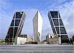 Madrid, Plaza Castilla, the monument for Jose Calvo Sotero and the Puerta de Europa Towers by architects Philip Johnson and John Burgee. Architects: Philip Johnson and John Burgee.